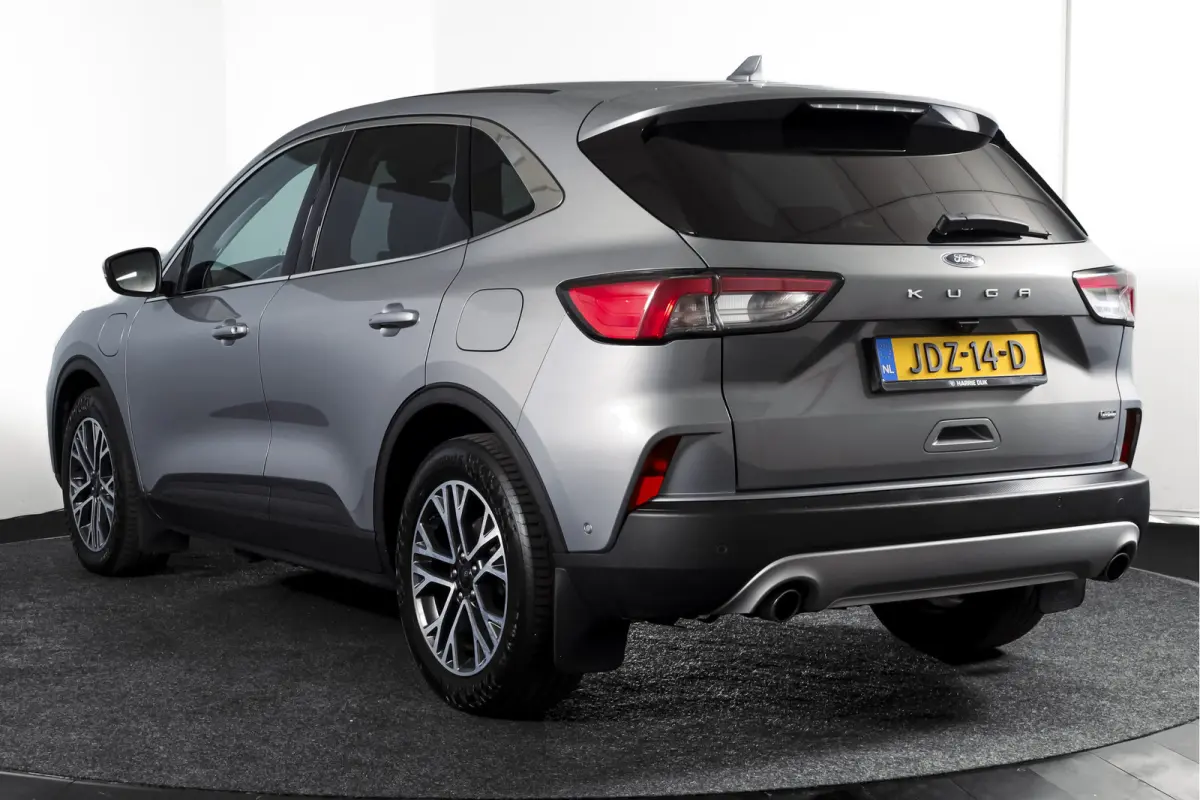 2.5 PHEV Titanium | Winterpakket | PDC V+A | Camera V+A | Navi + Carplay | Adapt. Cruise | PDC | Elek. Klep | LM 18" |