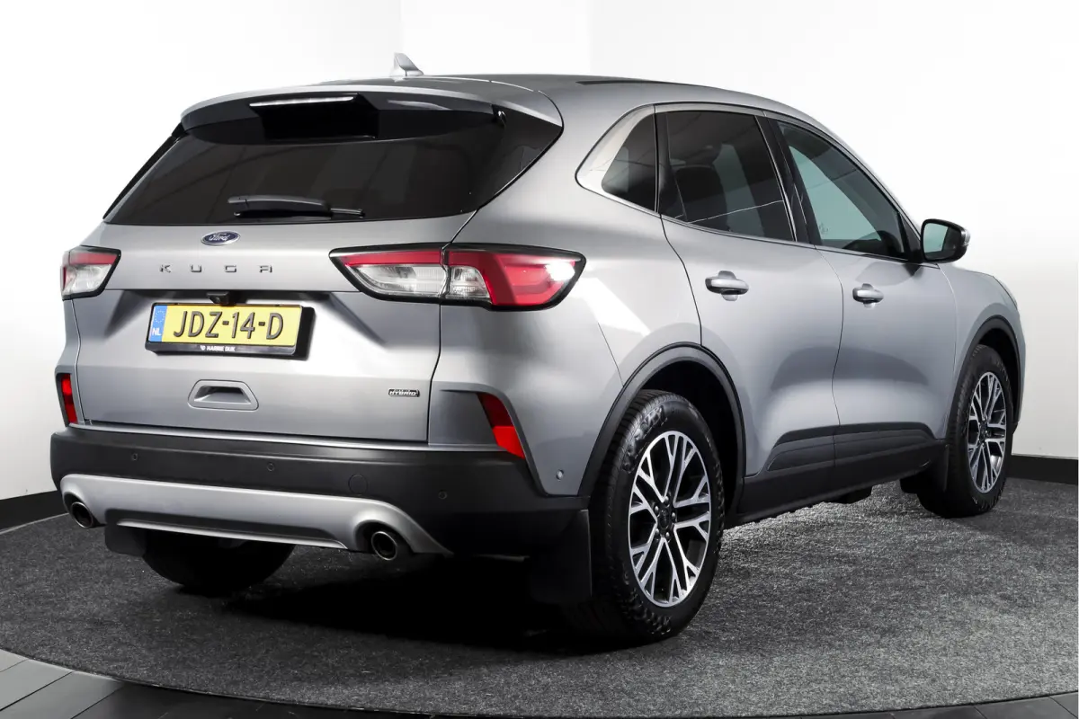 2.5 PHEV Titanium | Winterpakket | PDC V+A | Camera V+A | Navi + Carplay | Adapt. Cruise | PDC | Elek. Klep | LM 18" |
