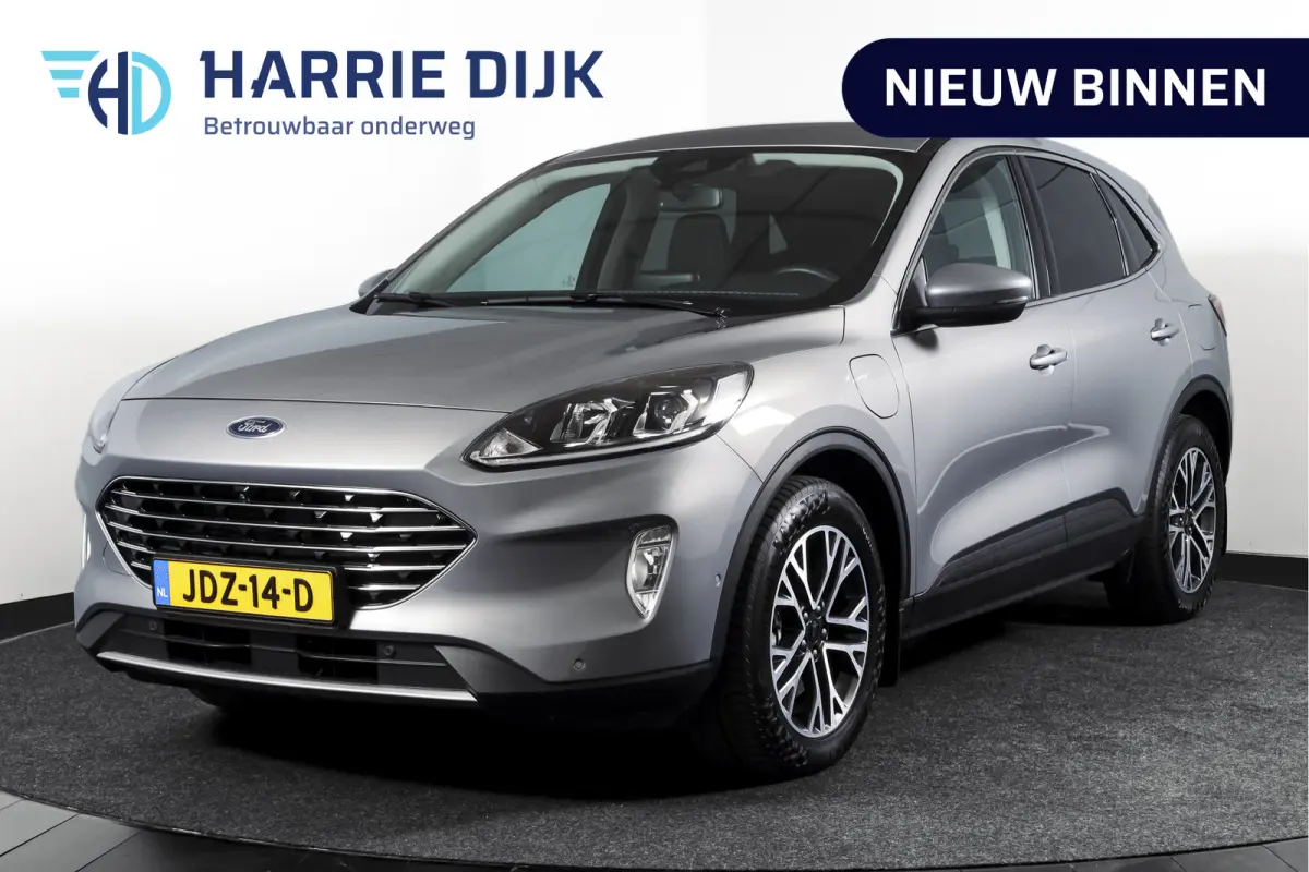 2.5 PHEV Titanium | Winterpakket | PDC V+A | Camera V+A | Navi + Carplay | Adapt. Cruise | PDC | Elek. Klep | LM 18" |