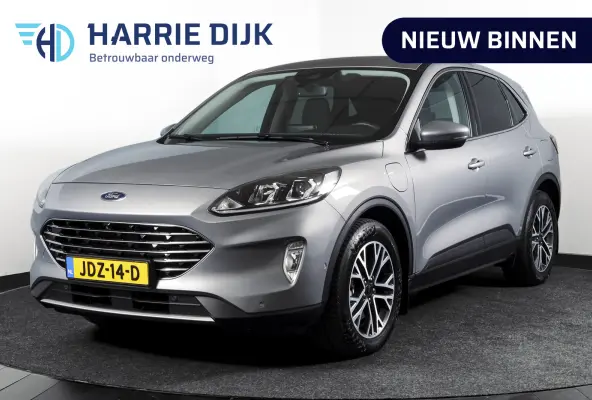 2.5 PHEV Titanium | Winterpakket | PDC V+A | Camera V+A | Navi + Carplay | Adapt. Cruise | PDC | Elek. Klep | LM 18" |
