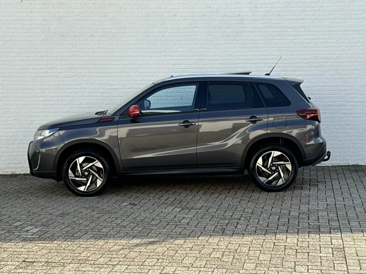 1.5 Hybrid Style Trekhaak 4 Seizoenen banden Panorama dak Camera Carplay Navigatie