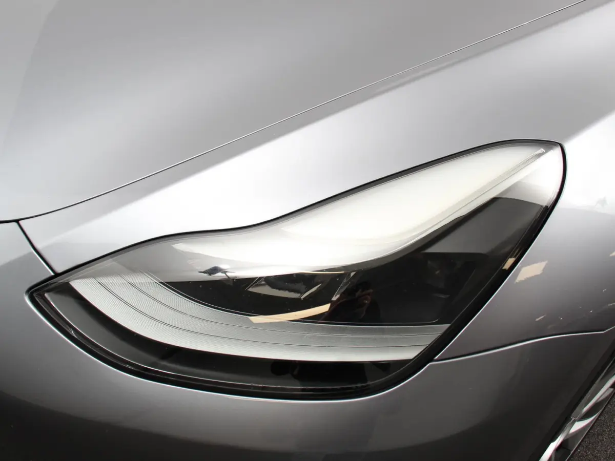 Long Range AWD 75 kWh Climate control Adaptieve cruise control Achteruitrijcamera Panoramadak Keyless Stuurverwarming Stoelverwarming LED Navigatie Parkeersensoren