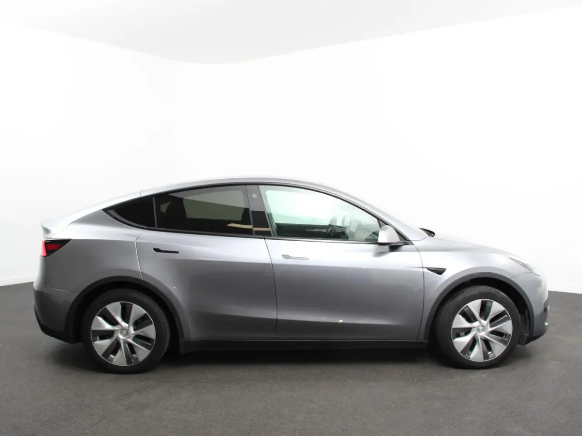 Long Range AWD 75 kWh Climate control Adaptieve cruise control Achteruitrijcamera Panoramadak Keyless Stuurverwarming Stoelverwarming LED Navigatie Parkeersensoren