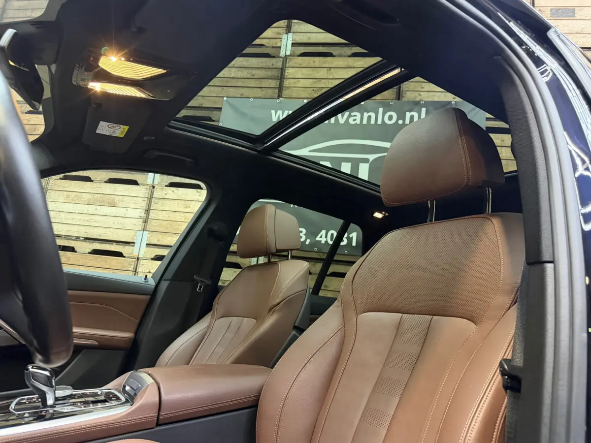 XDrive45e High Executive, Pano, 20"LM, Adptieve Cruise, HuD, Harman Kardon, Luchtvering, Stoel-Stuur en Achterbank verw.