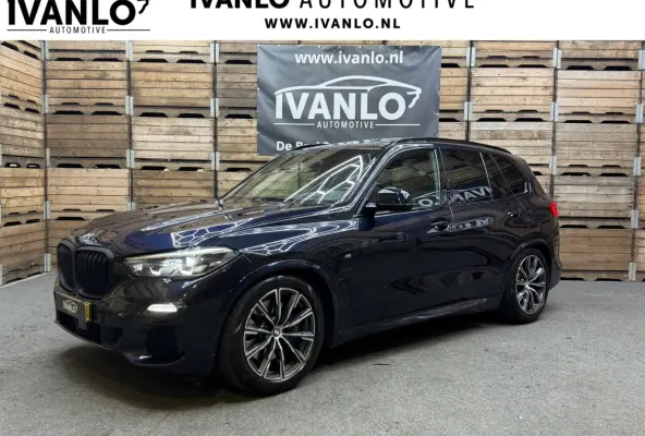 XDrive45e High Executive, Pano, 20"LM, Adptieve Cruise, HuD, Harman Kardon, Luchtvering, Stoel-Stuur en Achterbank verw.