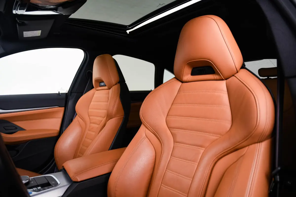 M50 High Executive 84 kWh Panoramadak - Driving Assistant Professional - Harman Kardon - Stuurwielrand verwarmd - Elektrisch verwarmde/verstelbare stoelen - Parking Assistant Plus - Getinte 