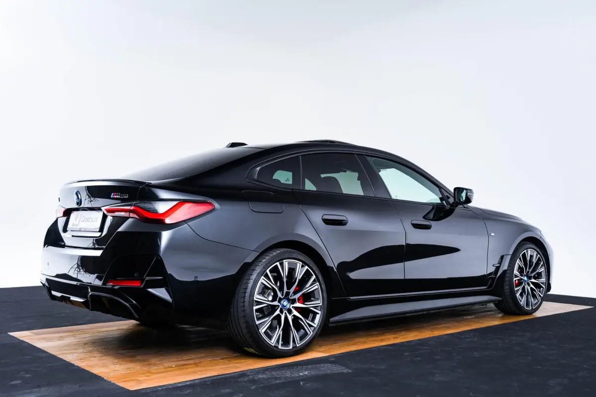 M50 High Executive 84 kWh Panoramadak - Driving Assistant Professional - Harman Kardon - Stuurwielrand verwarmd - Elektrisch verwarmde/verstelbare stoelen - Parking Assistant Plus - Getinte 