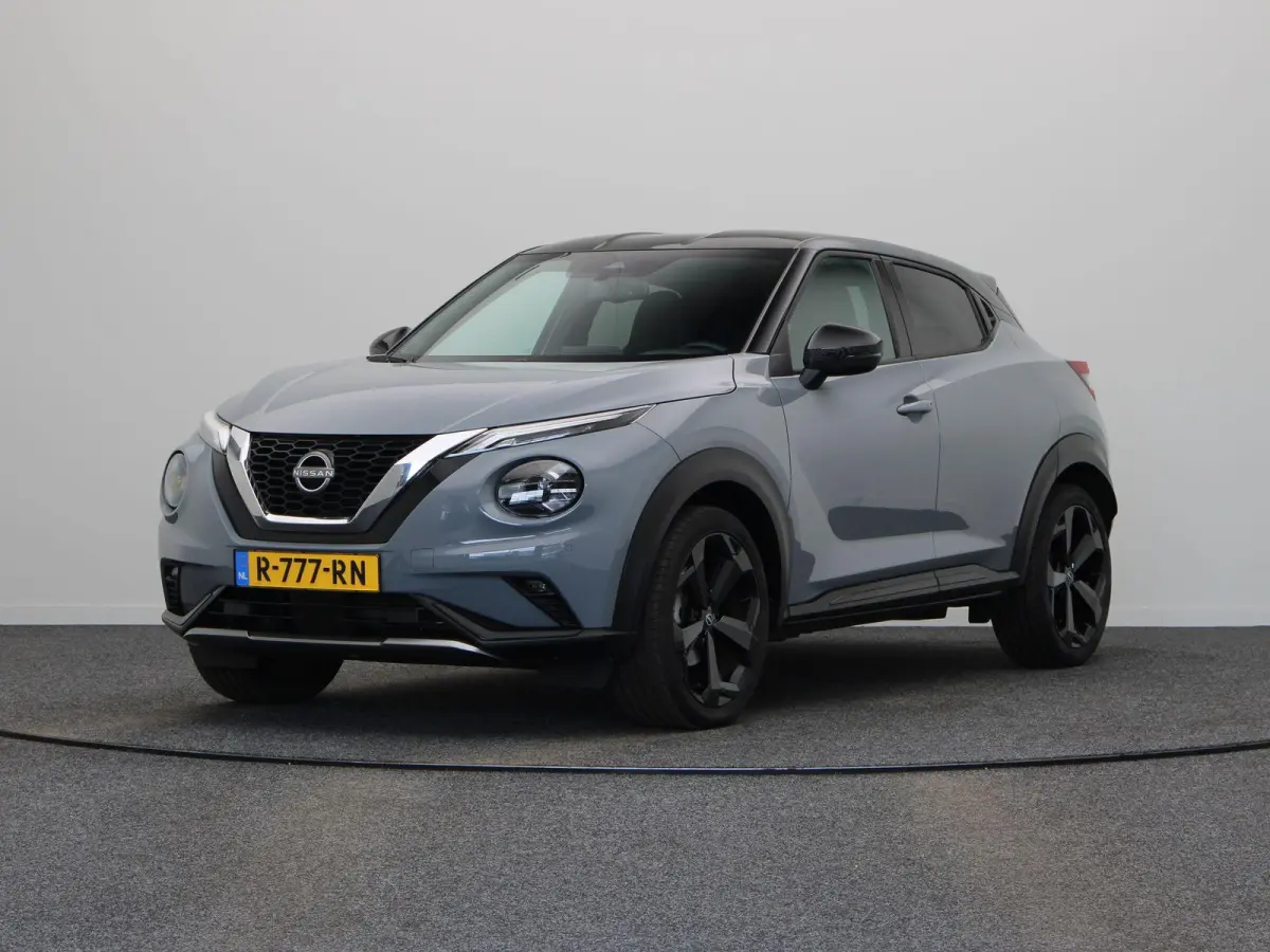 1.0 DIG-T Business Premium | Stoel en stuur verwarming | Climate control | Navigatie | Achteruitrij camera | Elektronische handrem met autohold | DAB radio |
