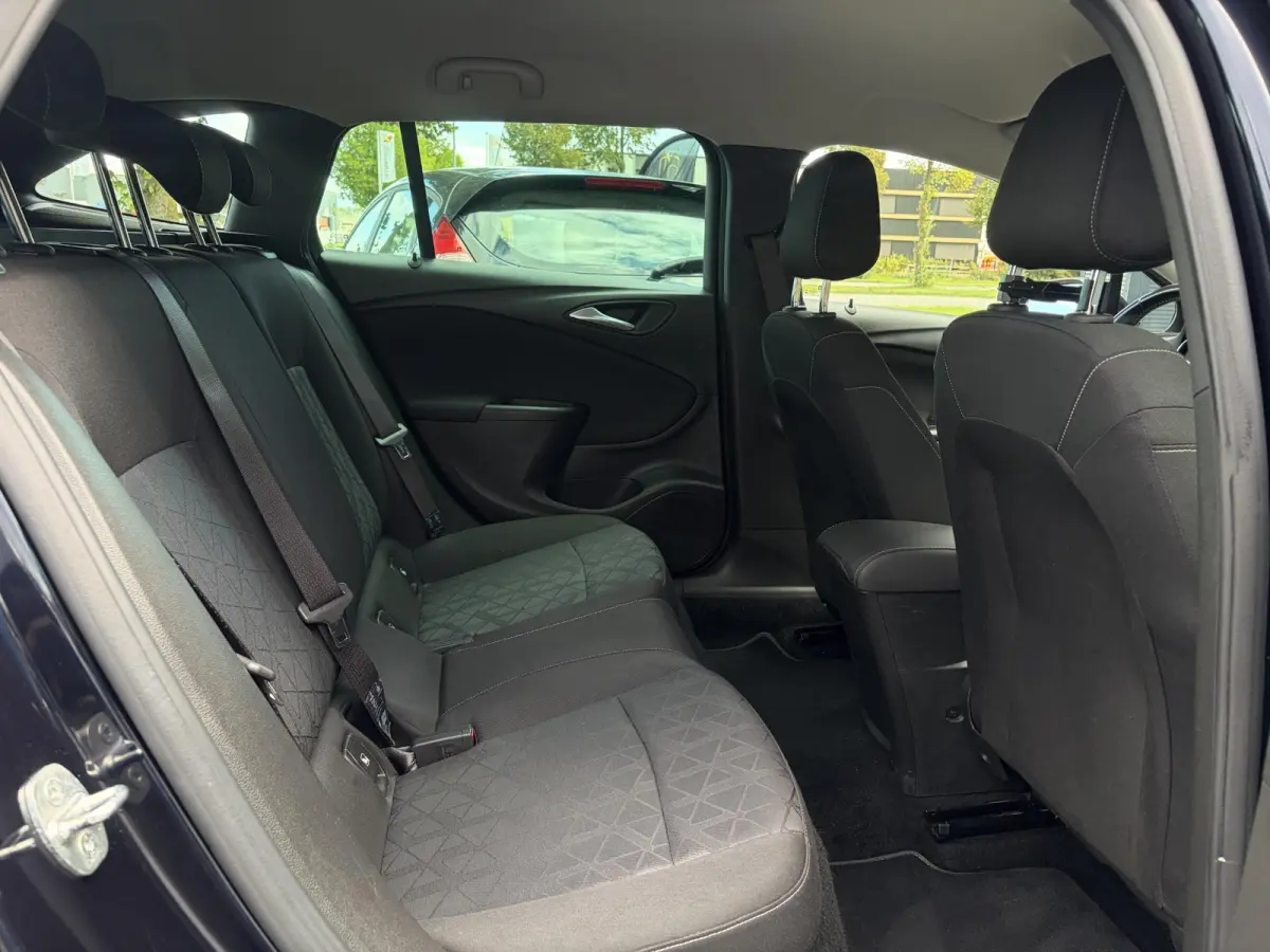 1.4 Turbo 120 Jaar Edition ✓150pk✓Carplay✓Navi✓Trekhaak✓Pdc V+A✓Clima✓Cruise✓6 Bak✓Lm velgen✓N.A.P✓Apk tot 02-2028