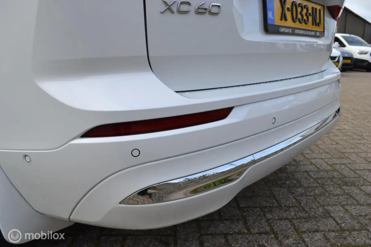 2.0 T6 Plug-in hybrid AWD Ultimate Bright | Head-up | Stoel + Stuurverwarming | Trekhaak | 360 gr camera | HK Audio |