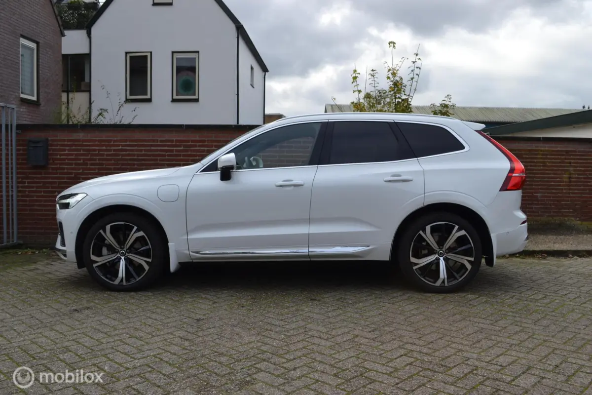 2.0 T6 Plug-in hybrid AWD Ultimate Bright | Head-up | Stoel + Stuurverwarming | Trekhaak | 360 gr camera | HK Audio |