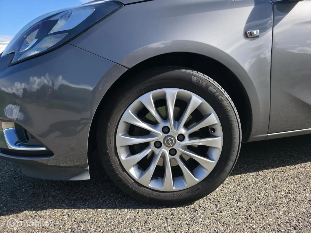 1.0 Turbo Business+ / Half leder / Cruise control