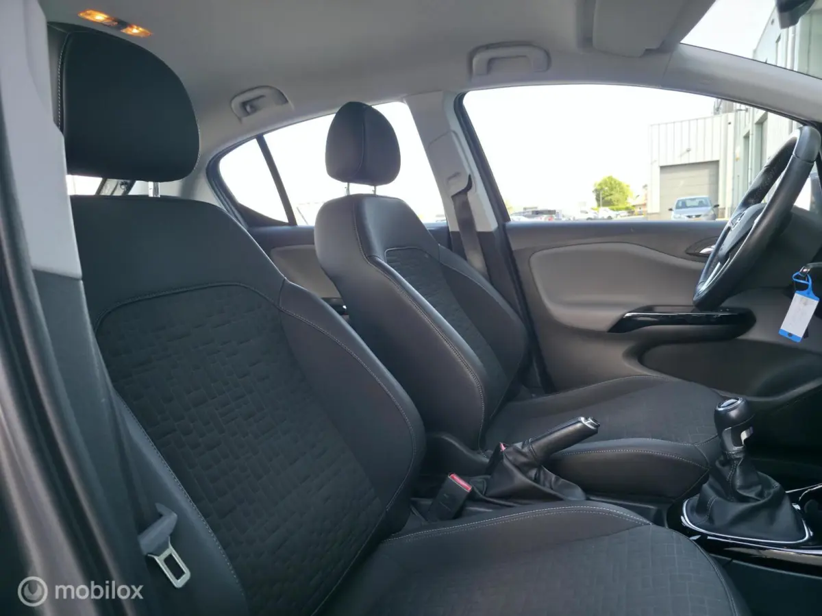 1.0 Turbo Business+ / Half leder / Cruise control