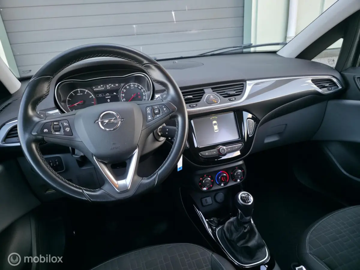 1.0 Turbo Business+ / Half leder / Cruise control