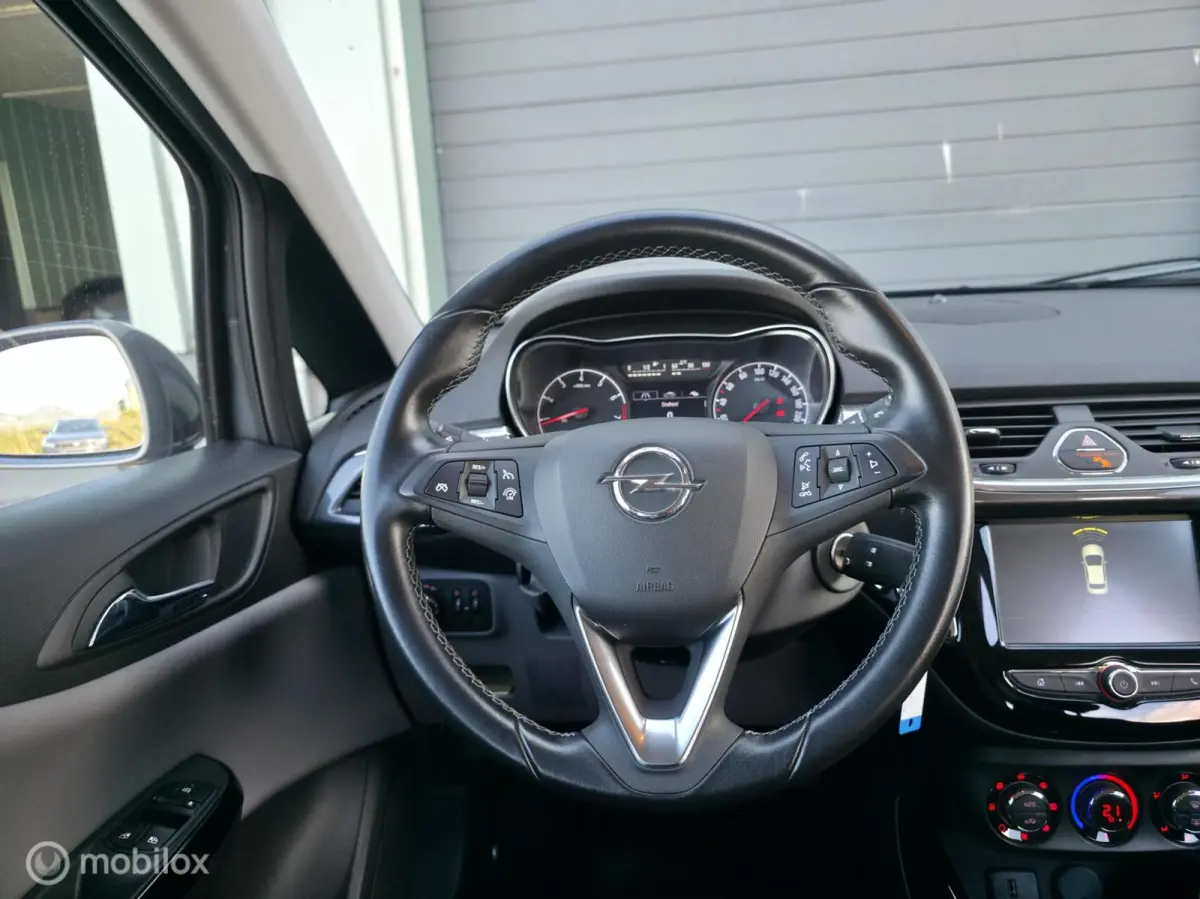 1.0 Turbo Business+ / Half leder / Cruise control