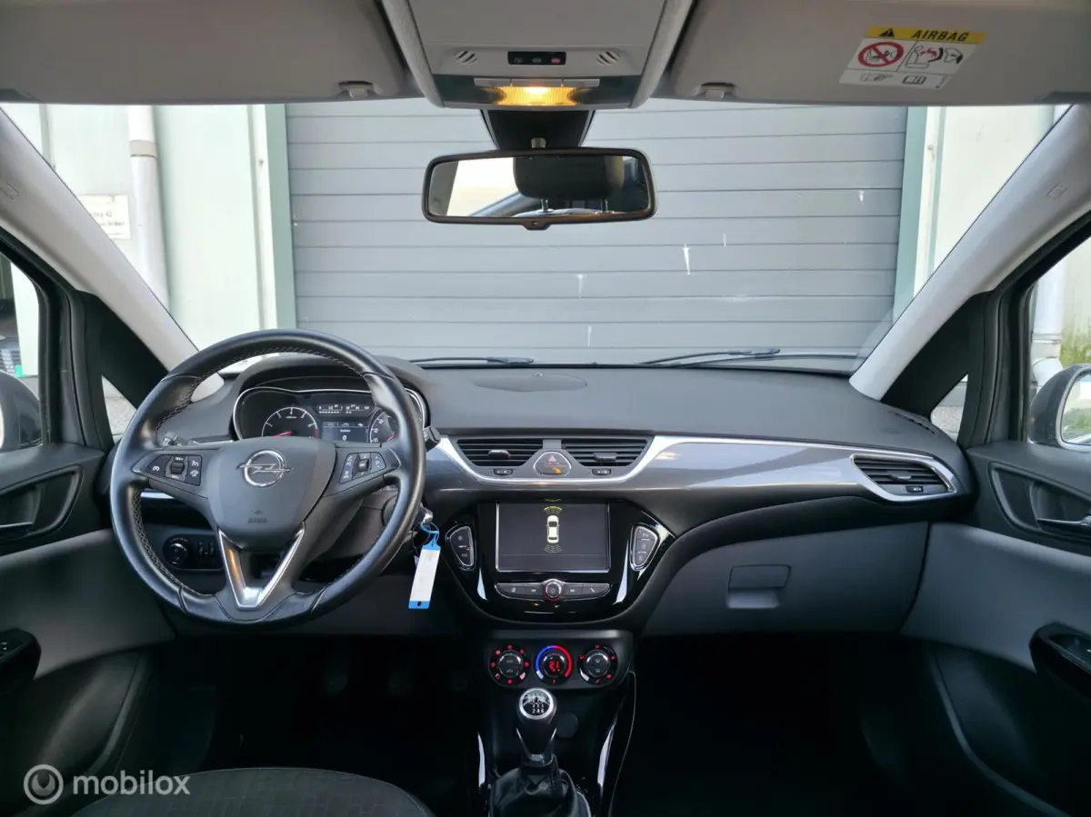 1.0 Turbo Business+ / Half leder / Cruise control