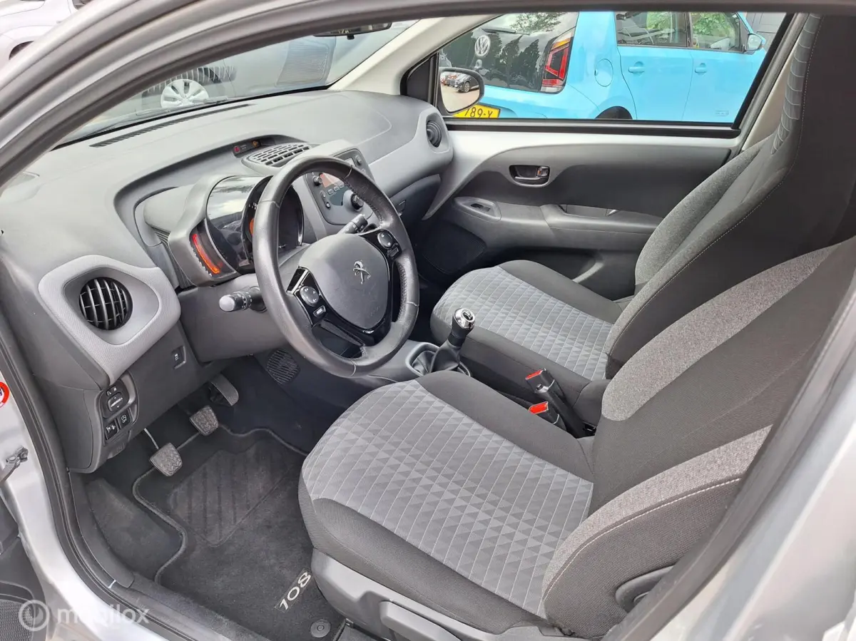 1.0 e-VTi ACTIVE • Airco • Bluetooth •