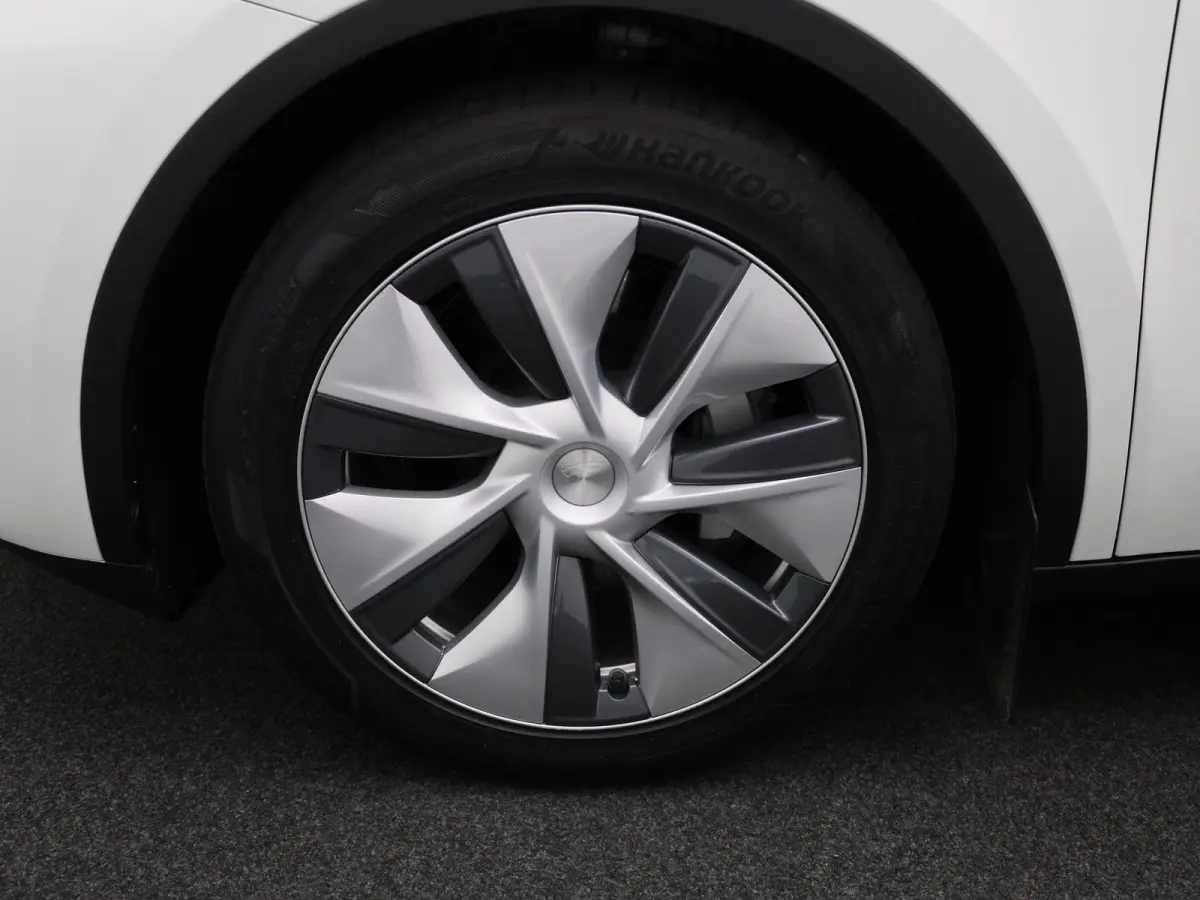 Long Range AWD 75 kWh | PANORAMADAK | ELEKTRISCHE KOFFERKELP | LEDEREN BEKLEDING | STOELVERWARMING | STUURWIELVERWARMING | PARKEERSENSOREN VOOR + ACHTER |