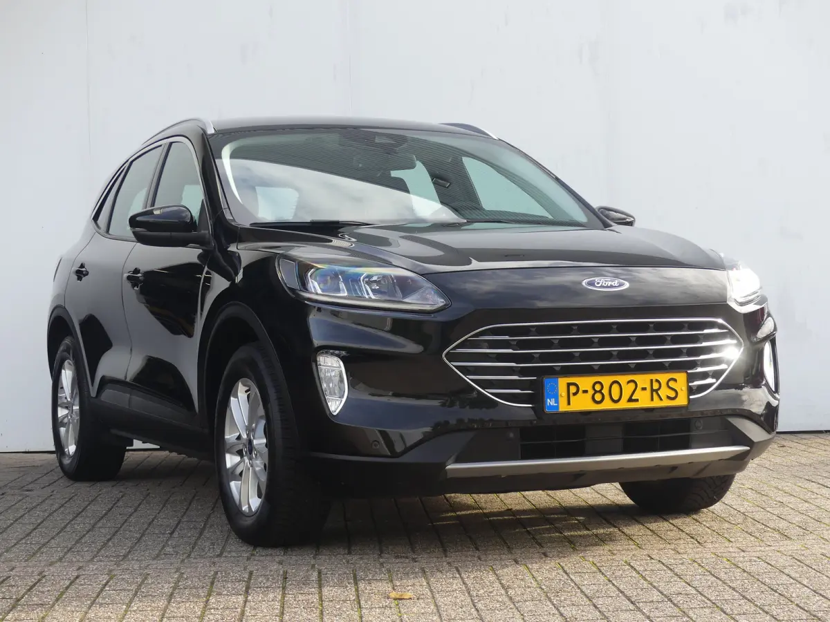 2.5 PHEV Titanium | CAMERA | PARKEERSENSOREN V+A | CRUISE | APPLE CARPLAY / ANDROID AUTO | NAVI | LMV 17" |