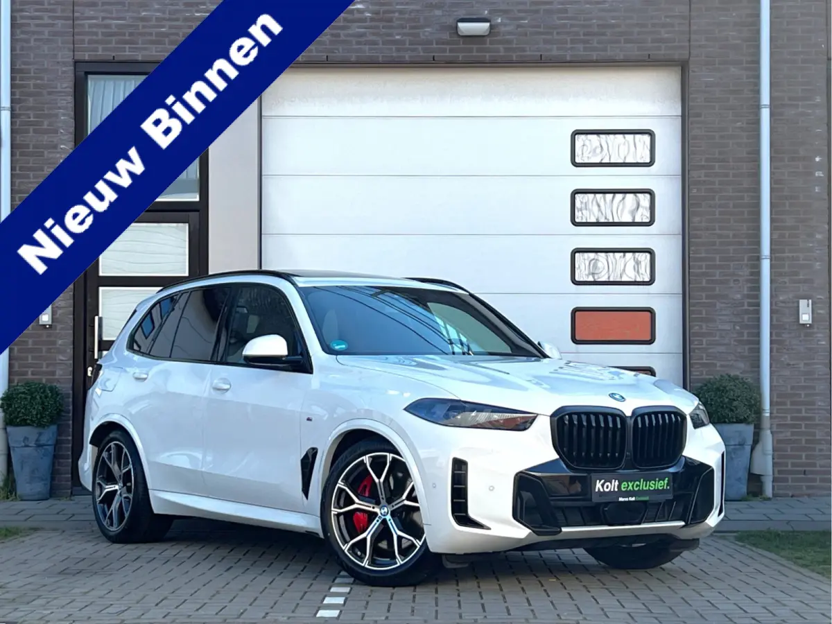 xDrive50e High Executive M Sport / BMW Nieren Iconic Glow / Head-UP / Panodak / Luchtvering / Soft Close / Harman-Kardon / 360 Camera / Trekhaak / Park Assist Prof / Individual Leder Merino 