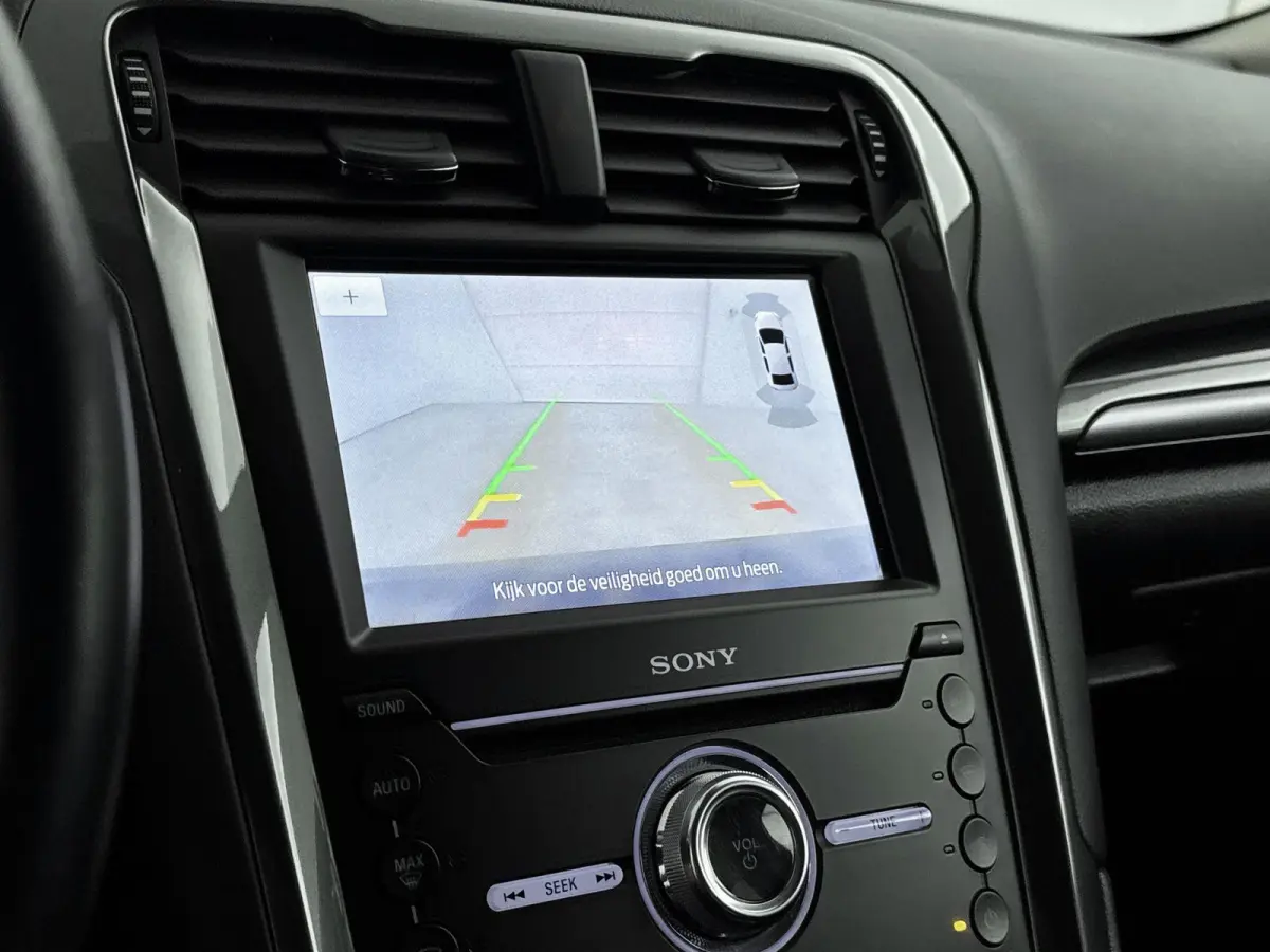 2.0 IVCT HEV Titanium | Achteruitrijcamera | Cruise Control | Navigatie | lichtmetalen velgen 16" |