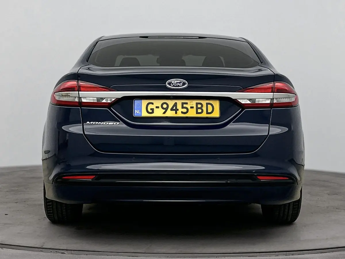 2.0 IVCT HEV Titanium | Achteruitrijcamera | Cruise Control | Navigatie | lichtmetalen velgen 16" |