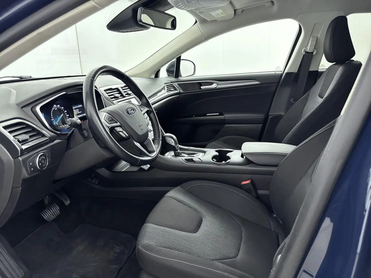 2.0 IVCT HEV Titanium | Achteruitrijcamera | Cruise Control | Navigatie | lichtmetalen velgen 16" |