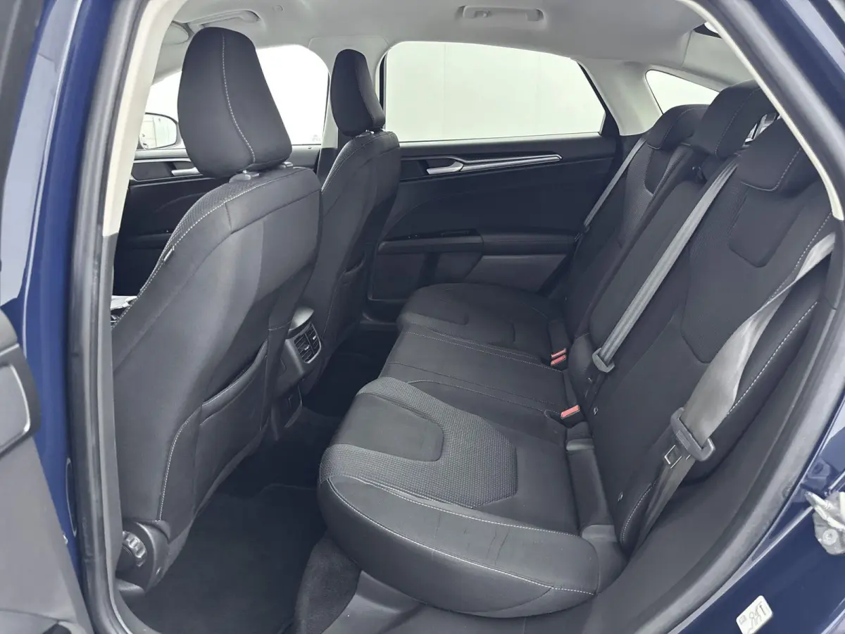 2.0 IVCT HEV Titanium | Achteruitrijcamera | Cruise Control | Navigatie | lichtmetalen velgen 16" |
