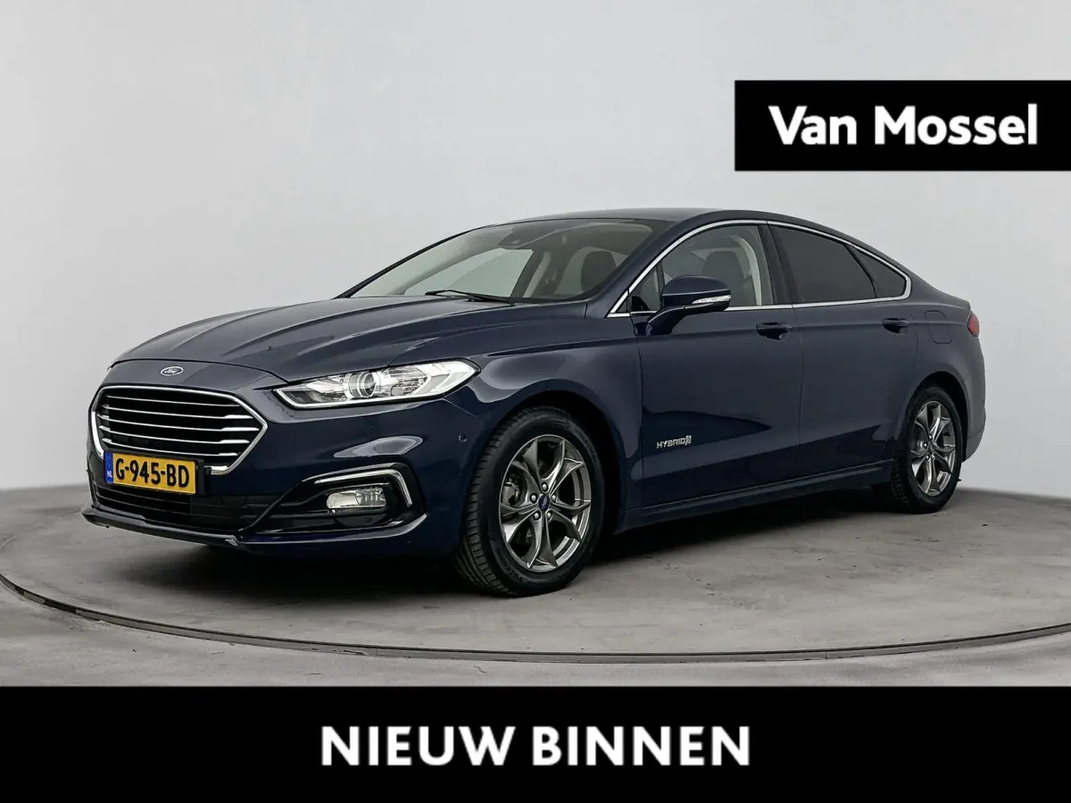 2.0 IVCT HEV Titanium | Achteruitrijcamera | Cruise Control | Navigatie | lichtmetalen velgen 16" |