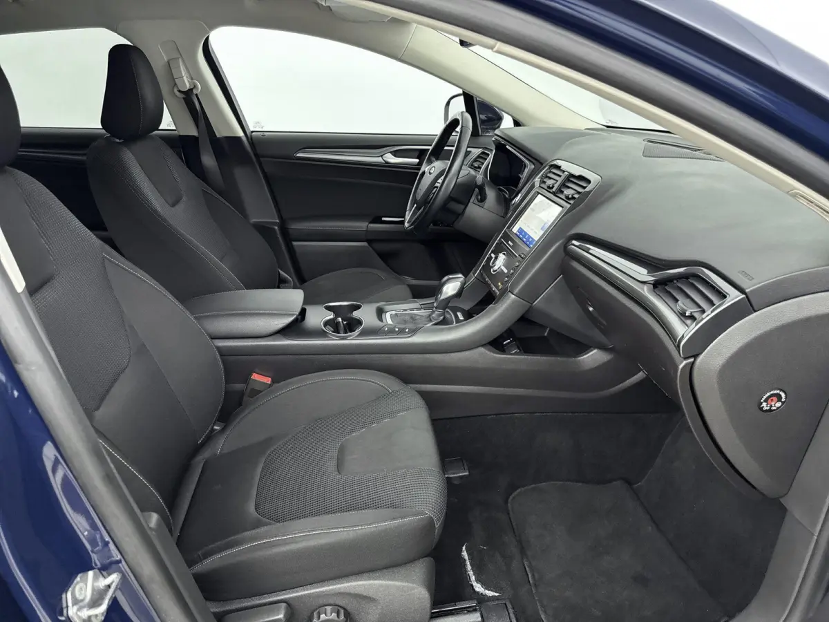 2.0 IVCT HEV Titanium | Achteruitrijcamera | Cruise Control | Navigatie | lichtmetalen velgen 16" |