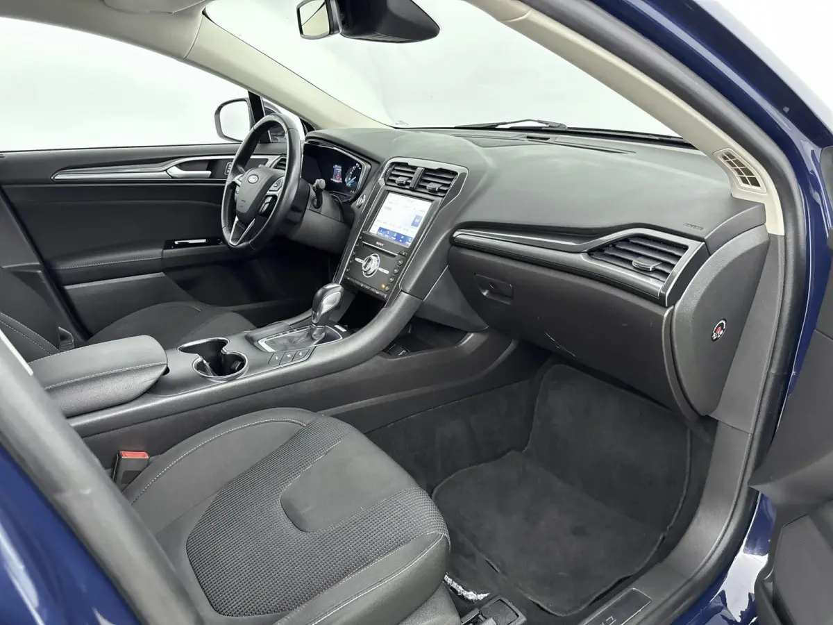 2.0 IVCT HEV Titanium | Achteruitrijcamera | Cruise Control | Navigatie | lichtmetalen velgen 16" |