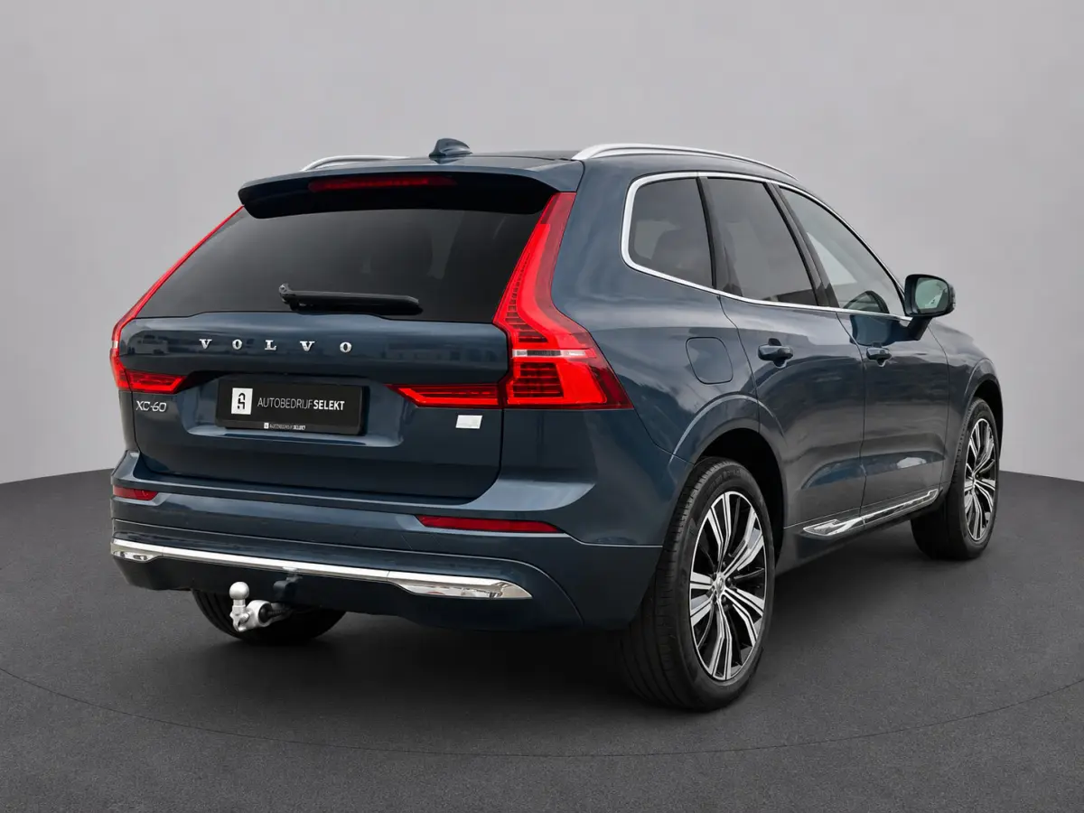 2.0 T6 Plug-in hybrid AWD Plus Bright | Pano | Trekhaak | Long Range | Elektrische stoelen | Denimblauw | Pilot Assist