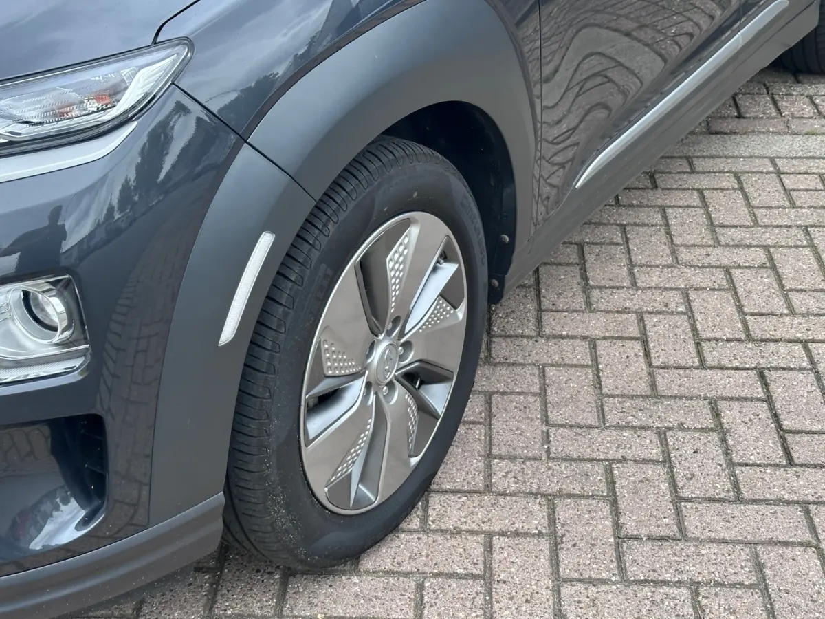 EV Premium 64 kWh SOH 100% TREKHAAK FASE 3 HEAD-UP LEER EL STOELEN