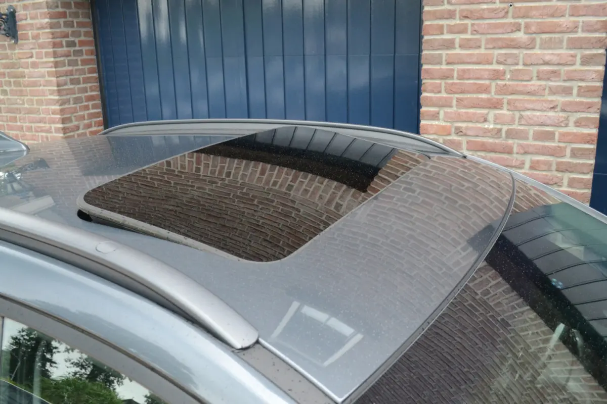 EV Premium 64 kWh | 98% SOH | Schuifdak | Keyless | Stoelventilatie/verwarming | Camera | Stuurverwarming