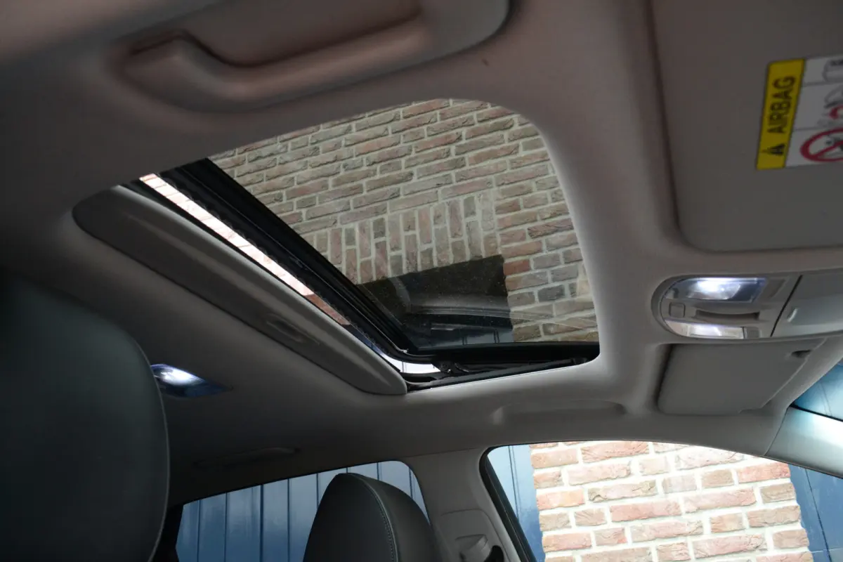 EV Premium 64 kWh | 98% SOH | Schuifdak | Keyless | Stoelventilatie/verwarming | Camera | Stuurverwarming