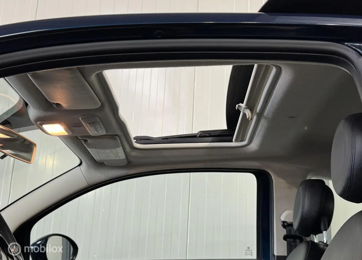 0.9 TwinAir Turbo Lounge [ NAP schuif kantel pano leer led ]
