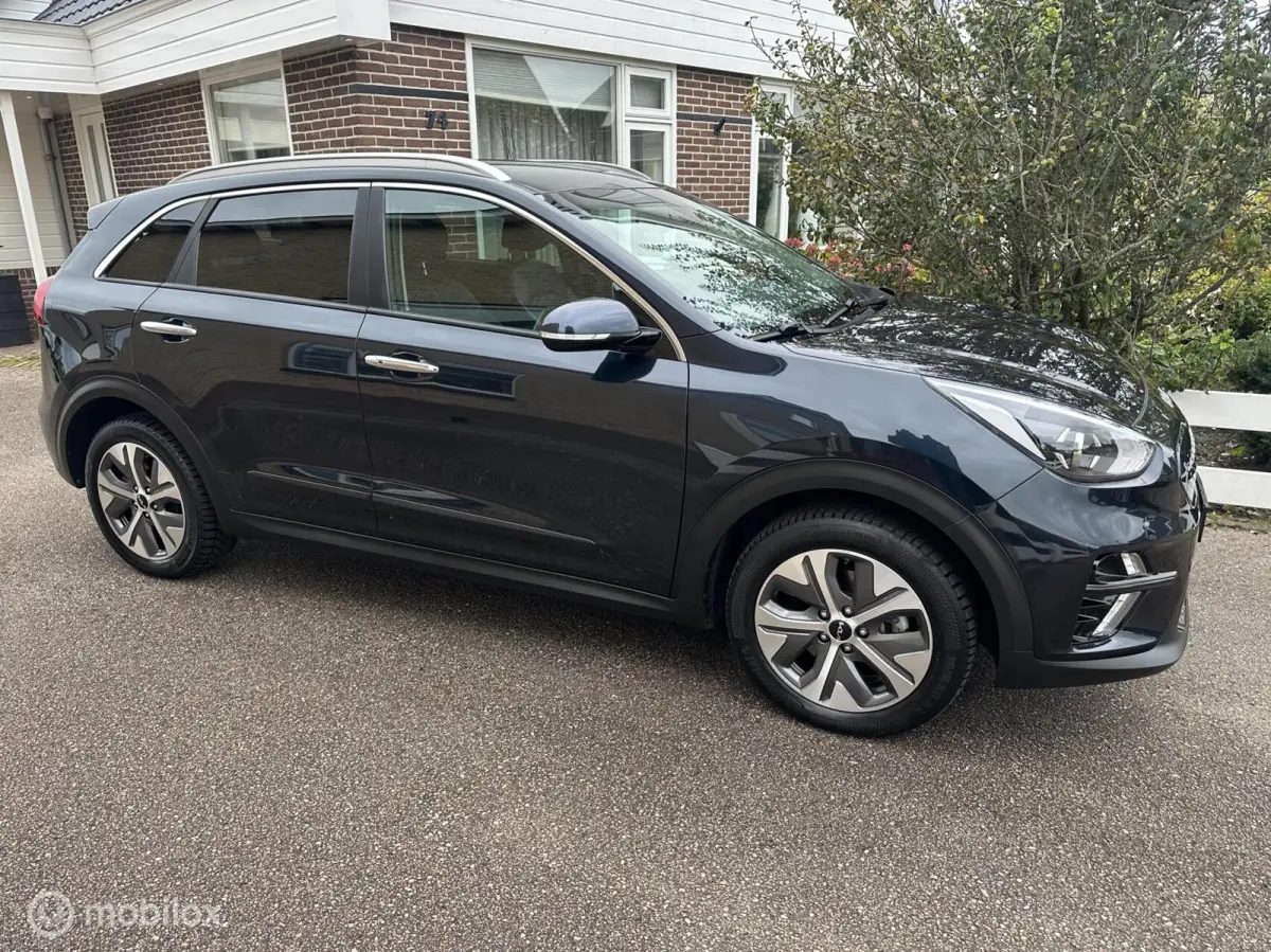 Edition 64 kWh 3-FASE ACHTERUITRIJ CAMERA CARPLAY STUUR/STOELVERWARMING