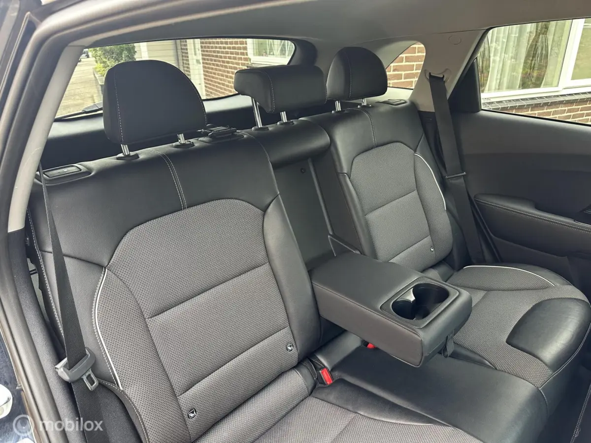 Edition 64 kWh 3-FASE ACHTERUITRIJ CAMERA CARPLAY STUUR/STOELVERWARMING