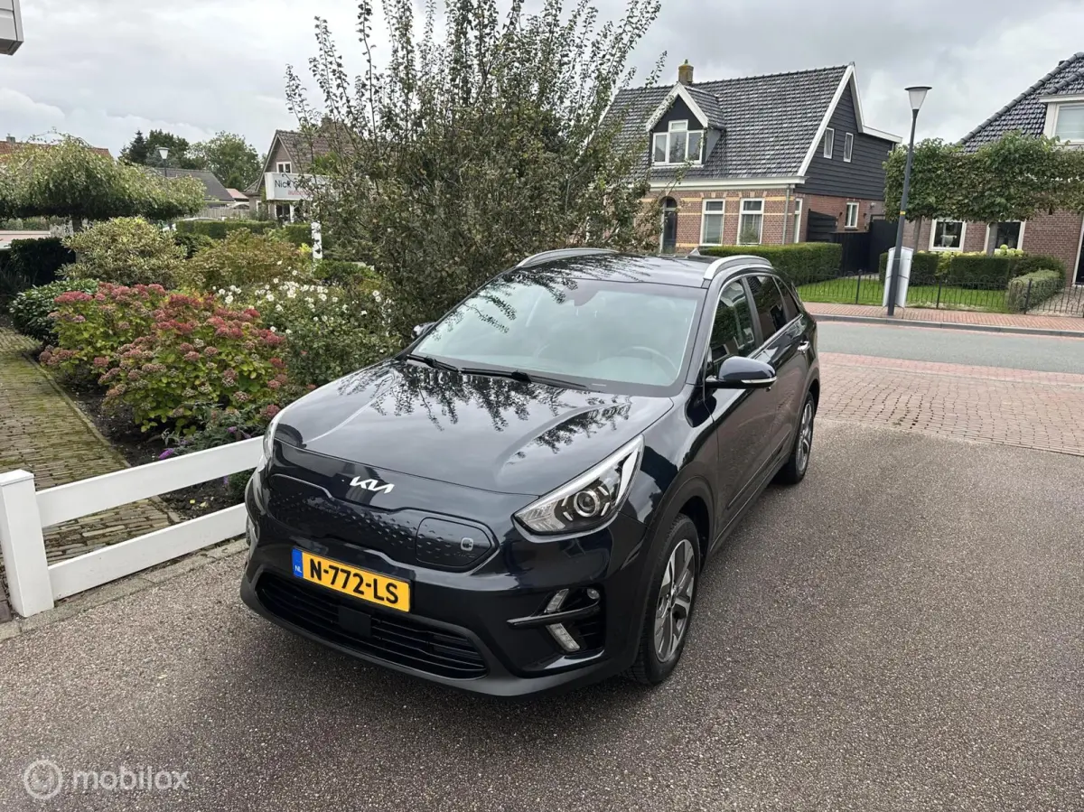 Edition 64 kWh 3-FASE ACHTERUITRIJ CAMERA CARPLAY STUUR/STOELVERWARMING