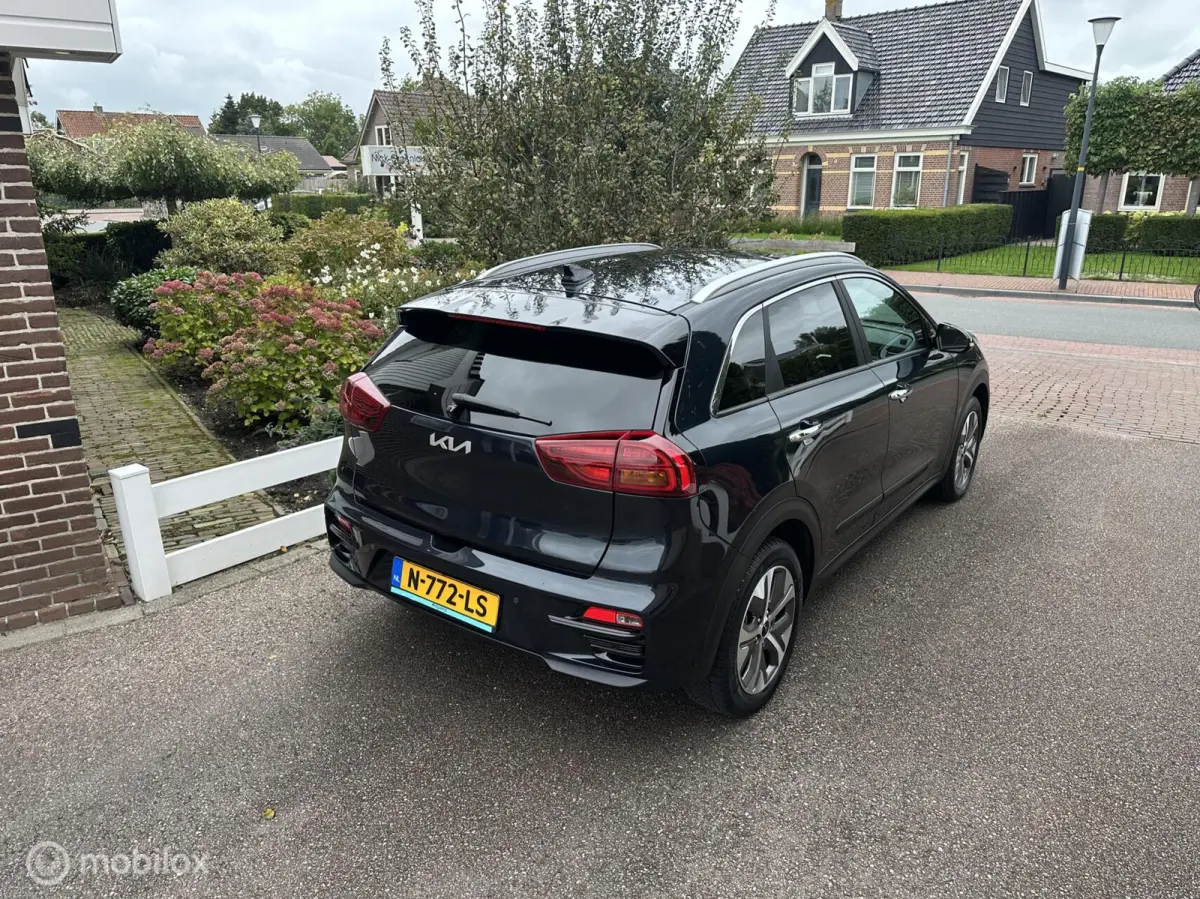 Edition 64 kWh 3-FASE ACHTERUITRIJ CAMERA CARPLAY STUUR/STOELVERWARMING