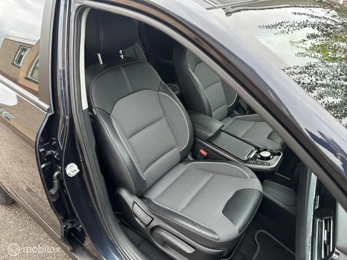 Edition 64 kWh 3-FASE ACHTERUITRIJ CAMERA CARPLAY STUUR/STOELVERWARMING