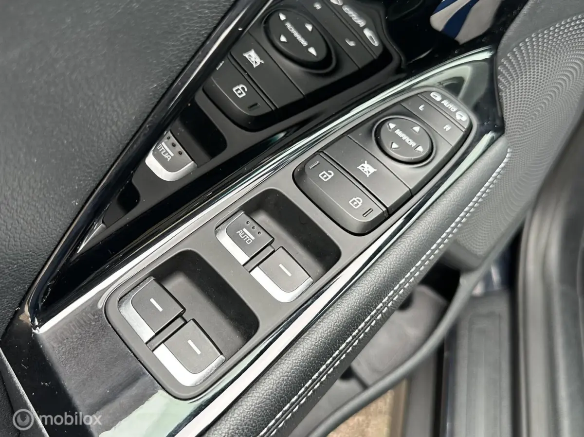 Edition 64 kWh 3-FASE ACHTERUITRIJ CAMERA CARPLAY STUUR/STOELVERWARMING