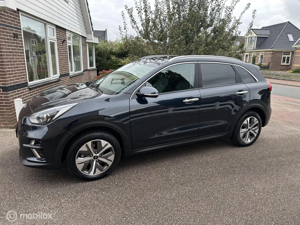 Edition 64 kWh 3-FASE ACHTERUITRIJ CAMERA CARPLAY STUUR/STOELVERWARMING