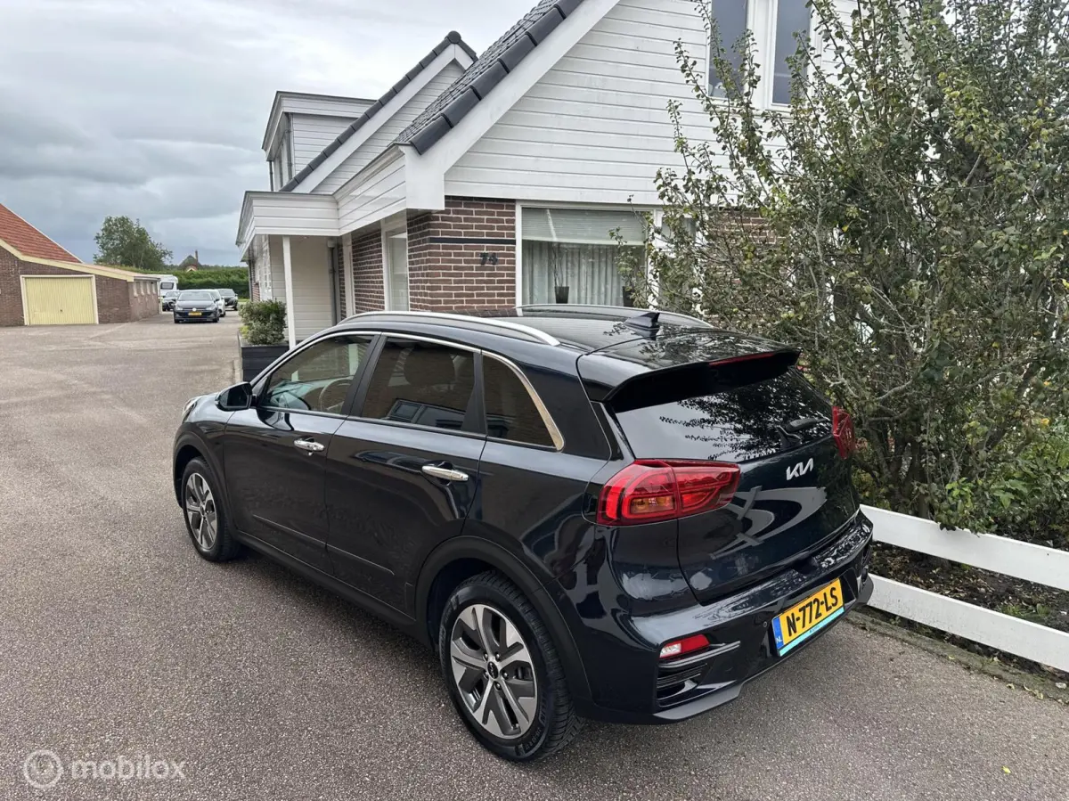Edition 64 kWh 3-FASE ACHTERUITRIJ CAMERA CARPLAY STUUR/STOELVERWARMING