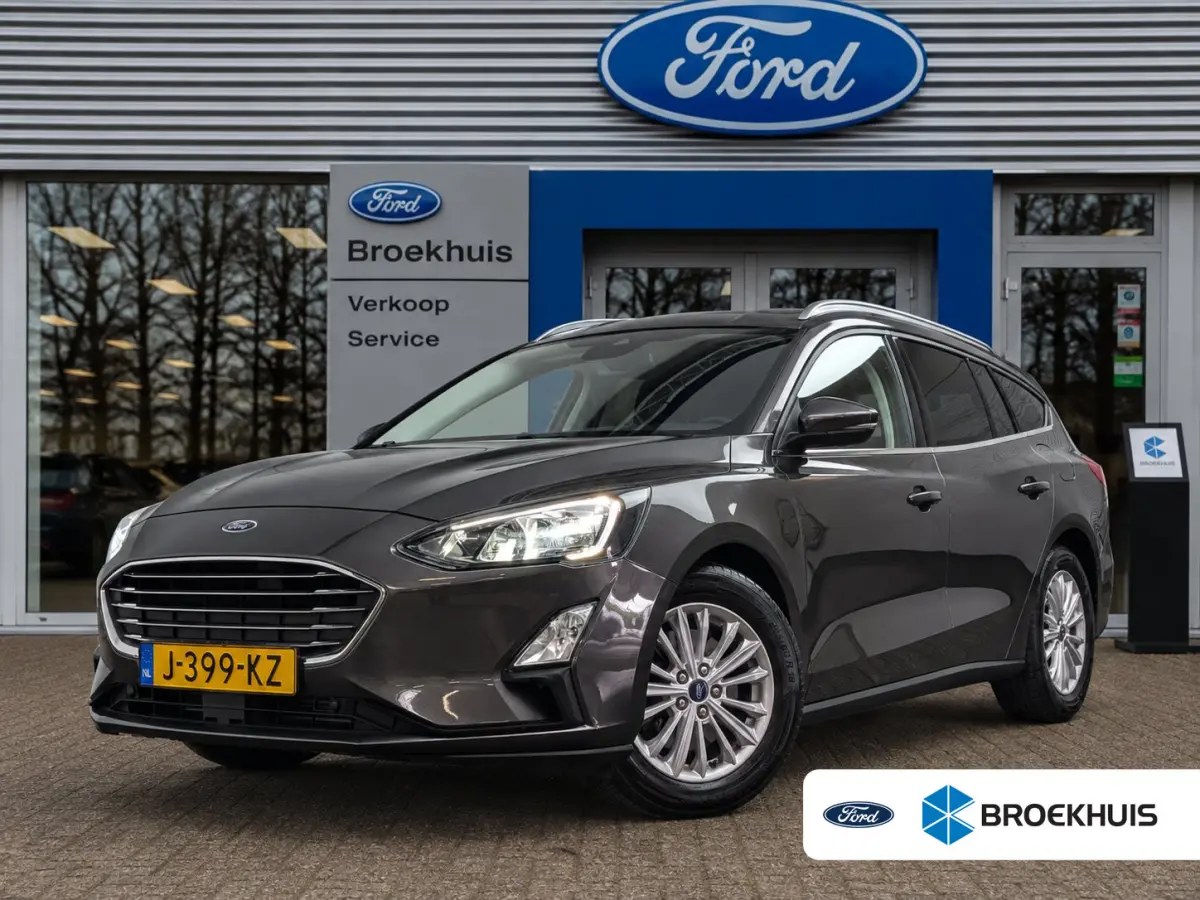 1.0EB Hybrid Titanium X Business | NL-AUTO! | 1E EIGENAAR! | TREKHAAK | CAMERA | CRUISE | NAVI | PARK SENS V+A | LANE ASSIST | DEALER OH! | ELEKTR. KOFFERBAK