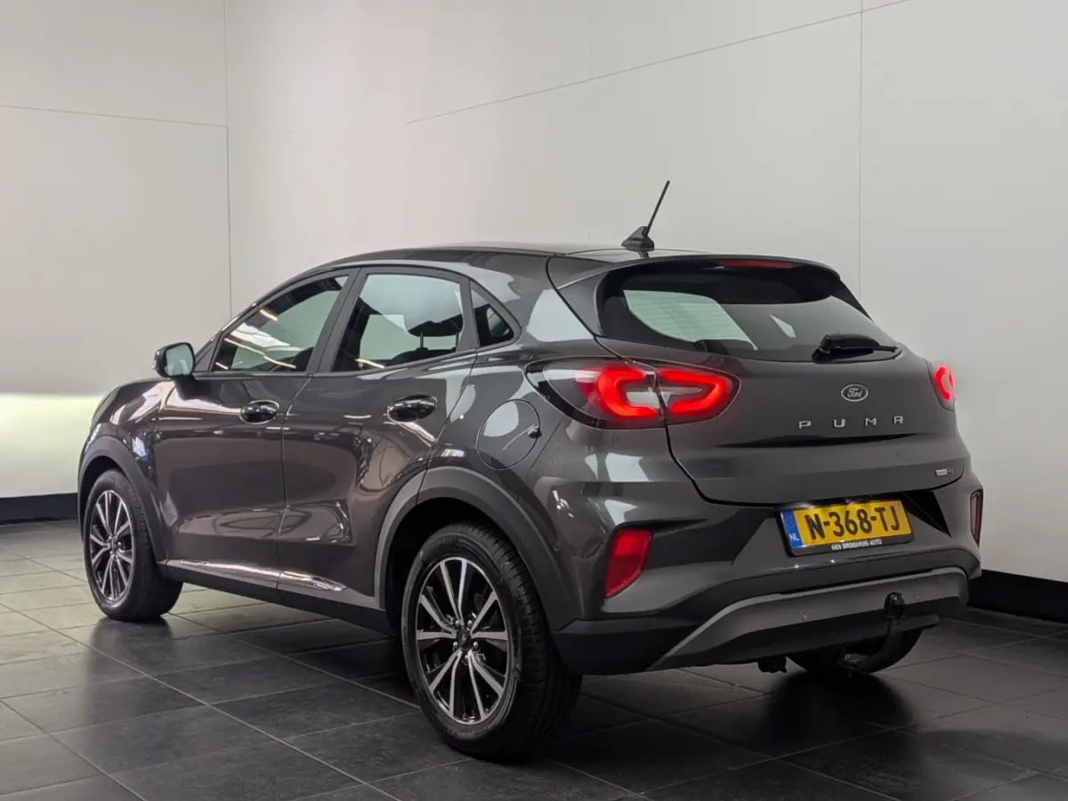 1.0EB Titanium | NL-AUTO! | 1E EIGENAAR! | WINTERPACK | TREKHAAK | ADAPTIVE CRUISE | DODE HOEK | CAMERA | PARK SENS V+A | DEALER OH! | LANE ASSIST