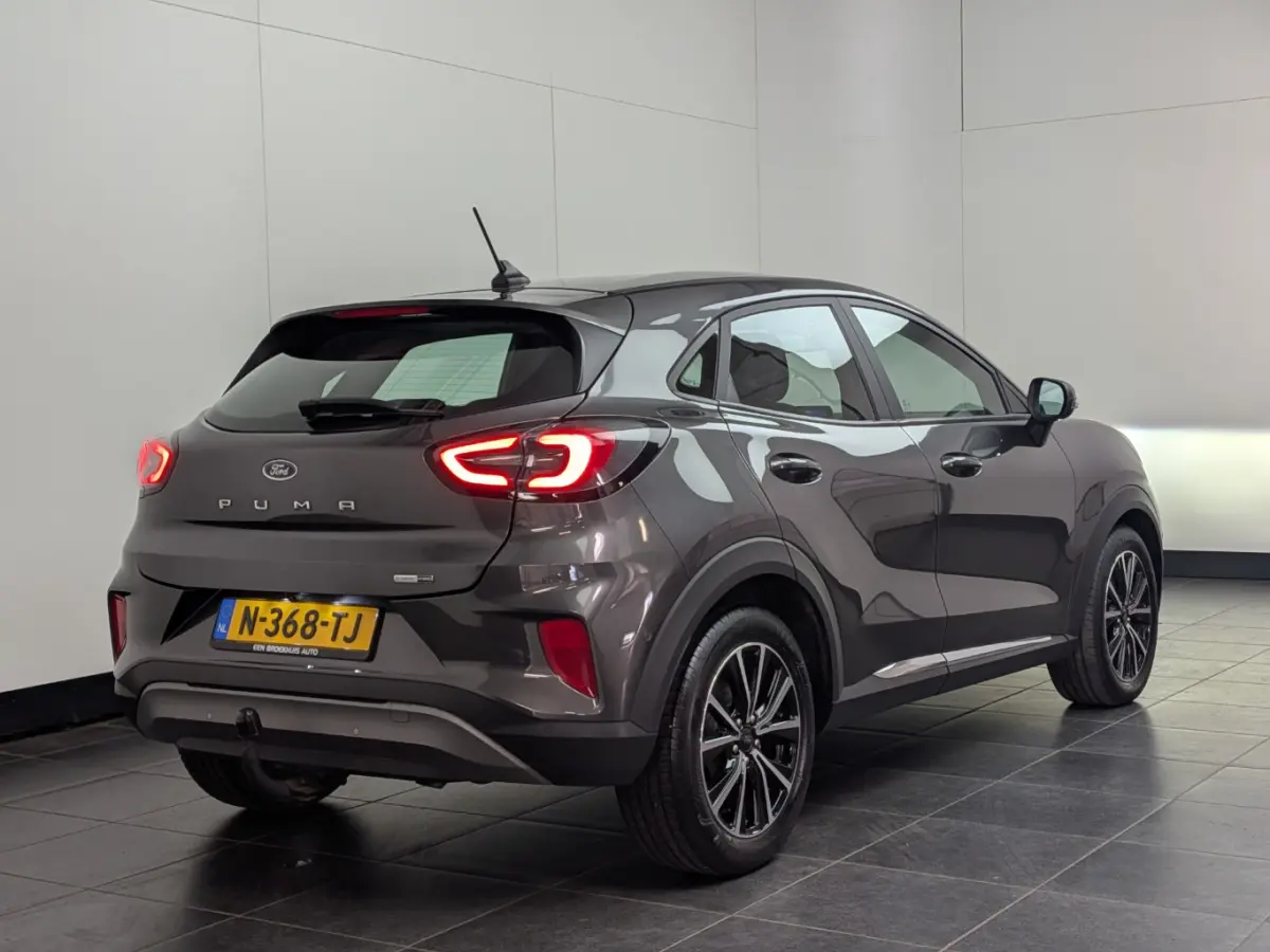 1.0EB Titanium | NL-AUTO! | 1E EIGENAAR! | WINTERPACK | TREKHAAK | ADAPTIVE CRUISE | DODE HOEK | CAMERA | PARK SENS V+A | DEALER OH! | LANE ASSIST