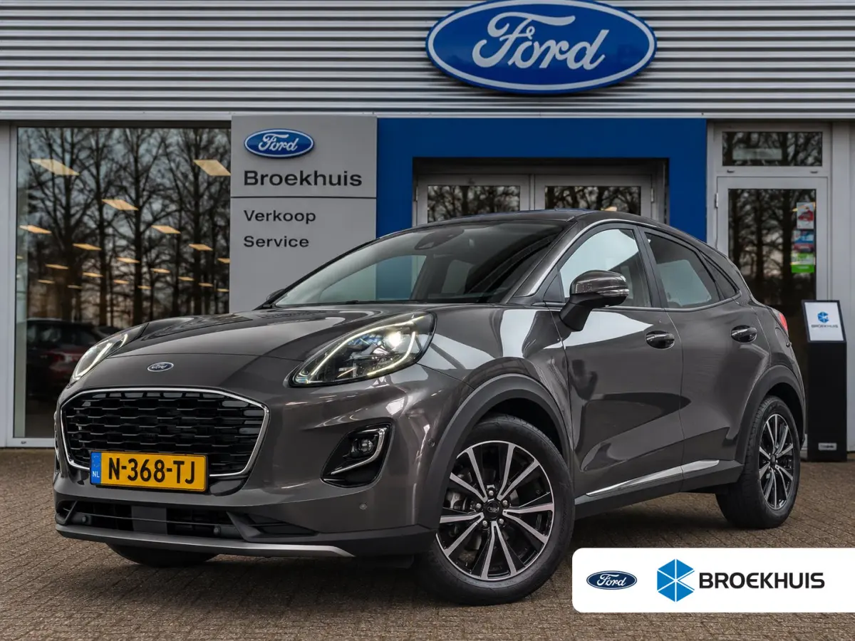 1.0EB Titanium | NL-AUTO! | 1E EIGENAAR! | WINTERPACK | TREKHAAK | ADAPTIVE CRUISE | DODE HOEK | CAMERA | PARK SENS V+A | DEALER OH! | LANE ASSIST
