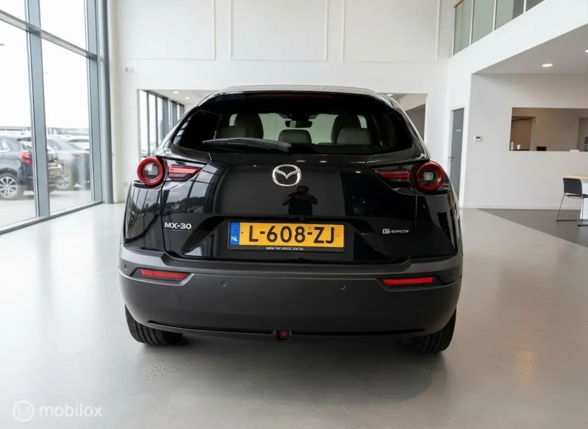 e-SkyActiv 145 | 36 kWh | SOH 91% | Interieurpakket | Half Leder | HUD