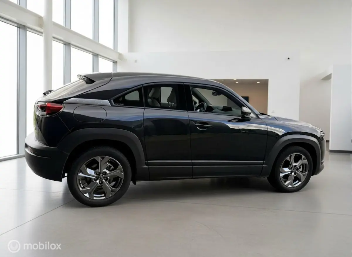 e-SkyActiv 145 | 36 kWh | SOH 91% | Interieurpakket | Half Leder | HUD